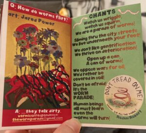a small paper booklet with a chant about worms inside 